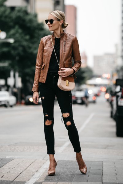 brown leather jacket with black skinny jeans