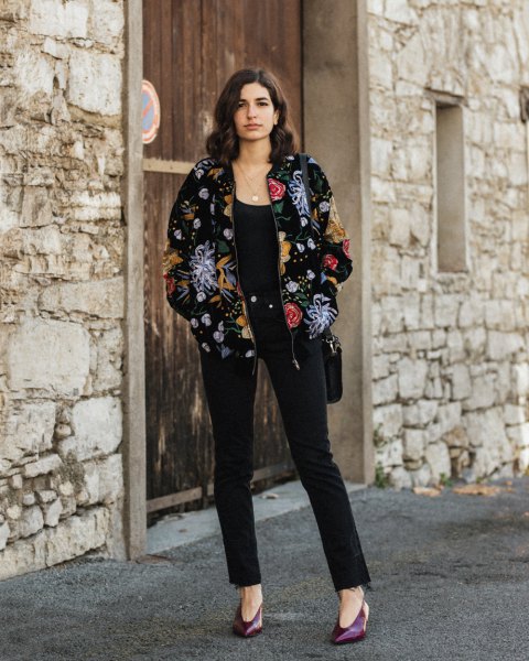 Floral velvet bomber jacket and black ankle jeans