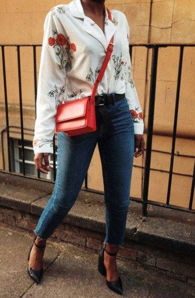 white floral blouse and blue jeans