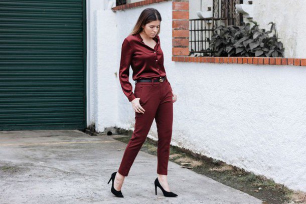 Burgundy shirt with buttons and green pants