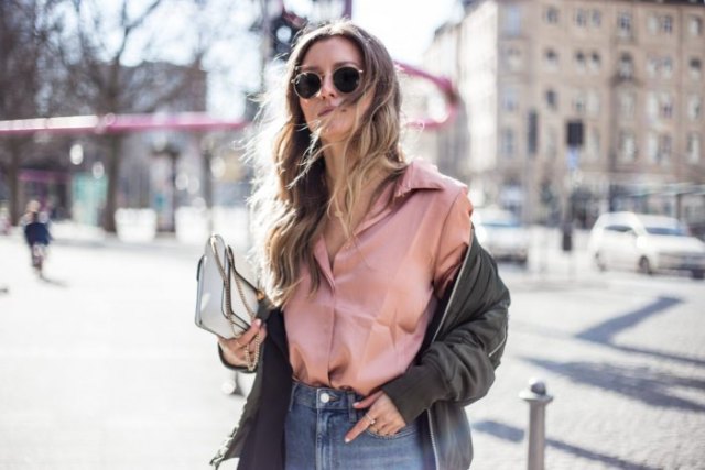rose gold satin buttoned shirt and green bomber jacket