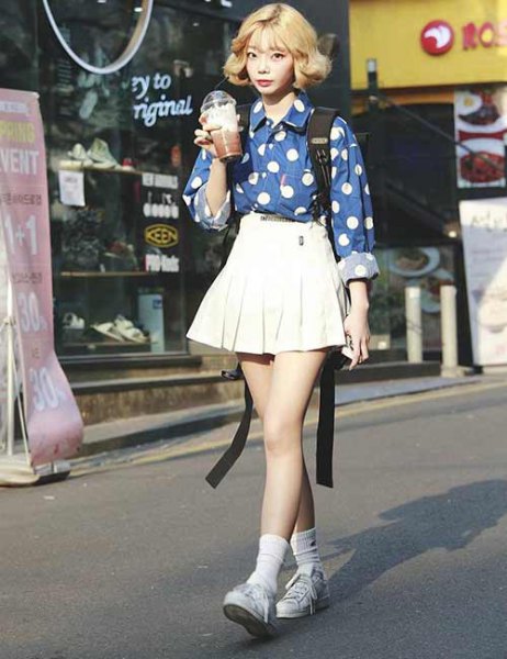 blue and white printed shirt with pleated skirt