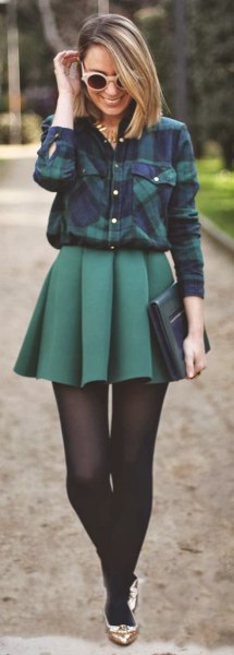 Navy checked shirt with gray pleated skirt