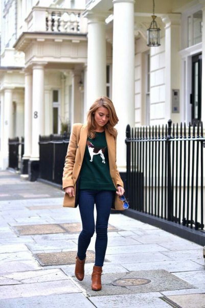 Camel-length wool coat with dark blue skinny jeans and brown leather boots