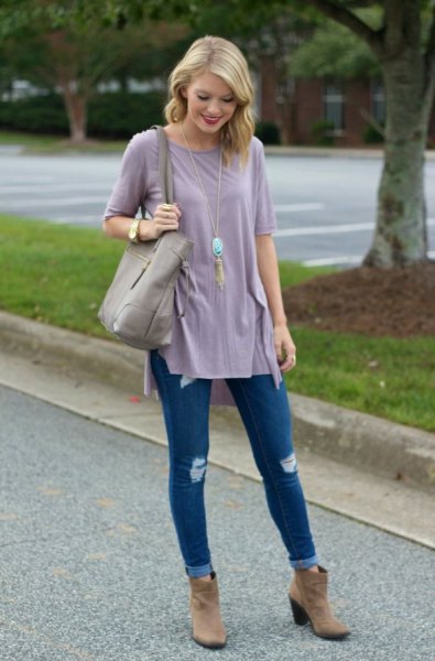 gray tunic t-shirt with blue ribbed cuffed skinny jeans and brown suede boots