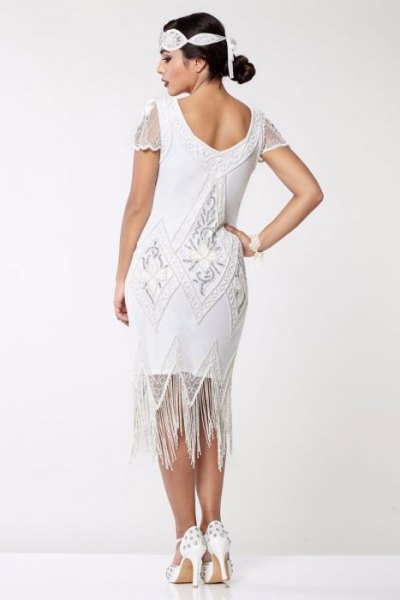 white dress with midi flapper fringes and cap sleeves