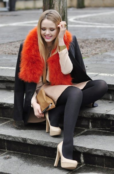 Orange faux fur scarf with dark blue wool coat and skirt