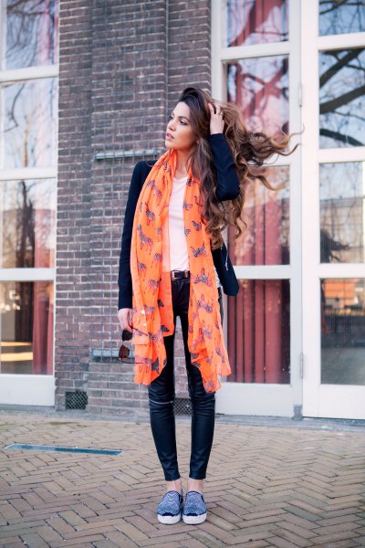orange printed long chiffon scarf with black blazer and skinny jeans