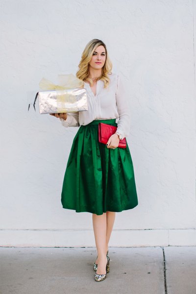 Slim fit blouse with green midi silk skirt