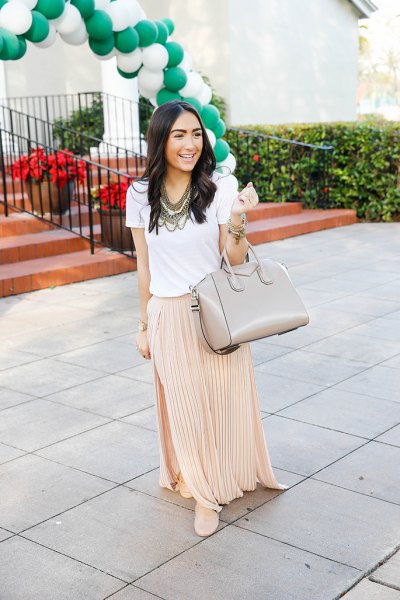white t-shirt with blush pink pleated maxi skirt