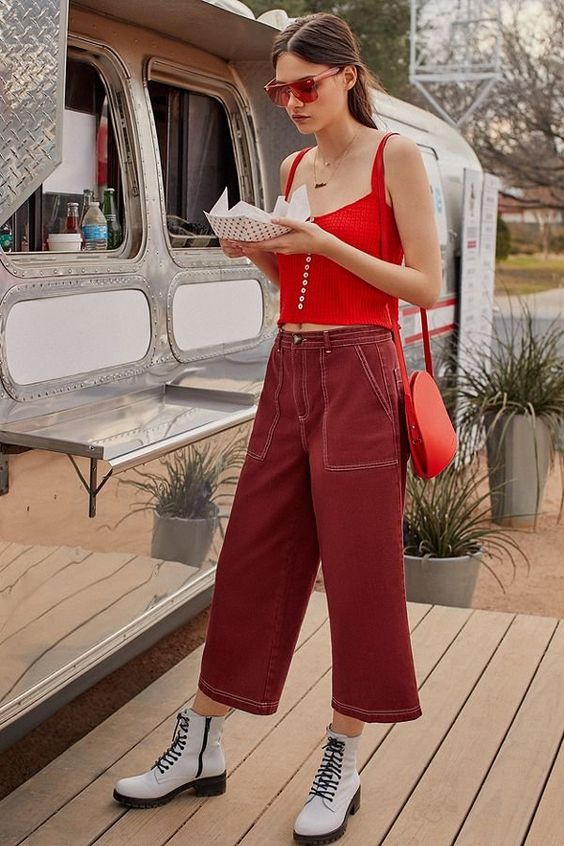 Matching red carpenter trousers