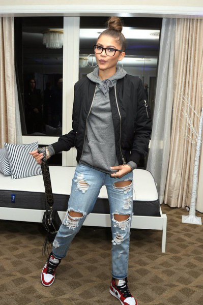 gray hoodie with black bomber jacket and ripped boyfriend jeans