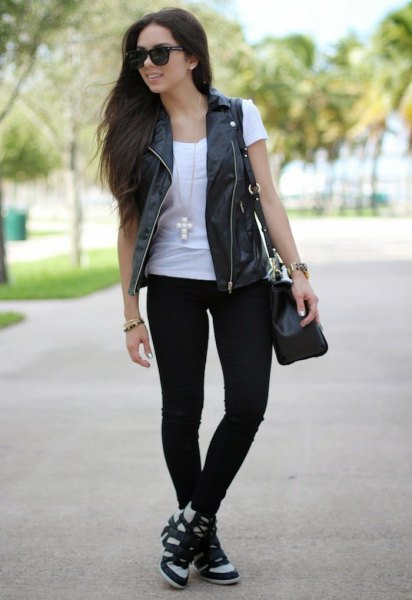 black leather vest white t-shirt jeans
