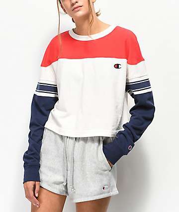 red, white, and navy color block sweatshirt with gray shorts