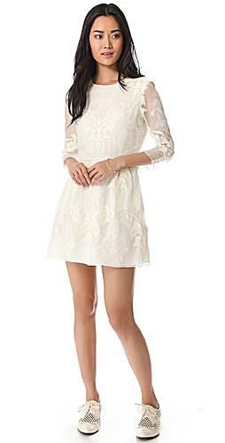 white mini dress with pointy and flared shoes with lace and wing tip