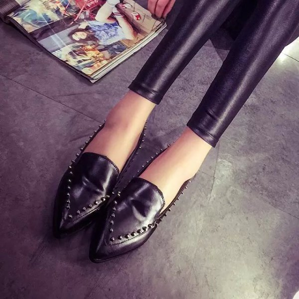 black leggings with matching studded wingtip shoes