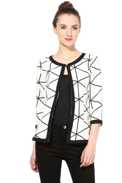 white and black printed shrug with vest top jeans