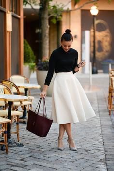 black button down shirt and white high waist midi skirt