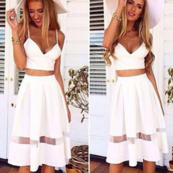 white bodycon crop top with a high, flared midi skirt