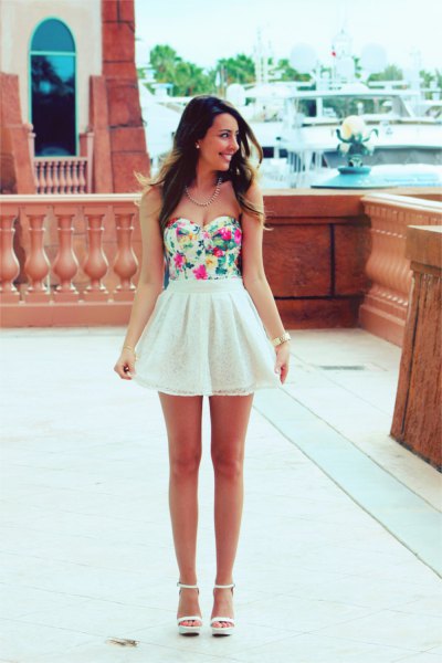 Floral print strapless bodice and high waist white Chiron mini skirt