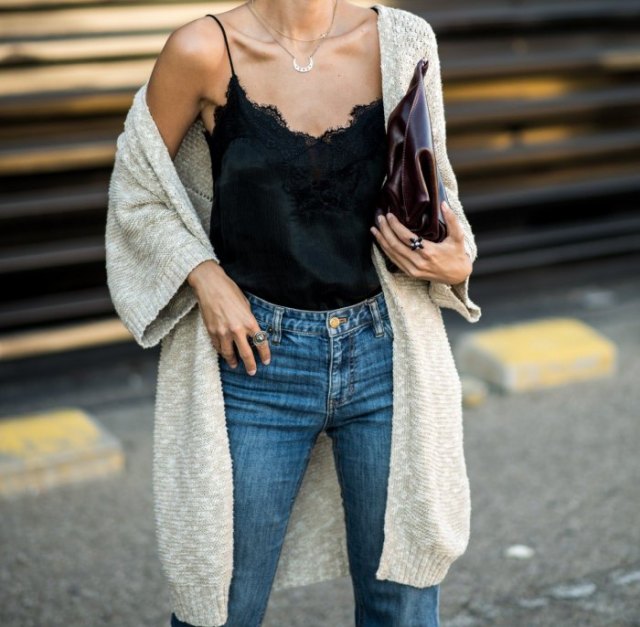 black low-cut top with spaghetti straps and light gray longline cardigan