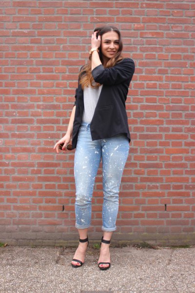 black blazer with white t-shirt and light blue jeans with cuffs