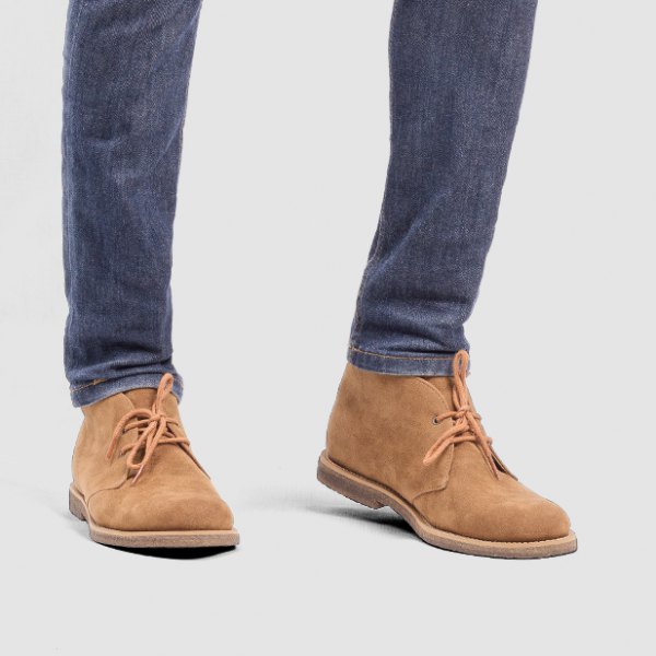 Camel suede wingtip shoes with dark blue slim fit jeans