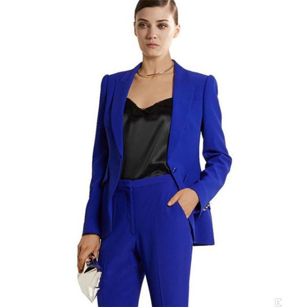 Royal blue suit with black low-cut silk blouse