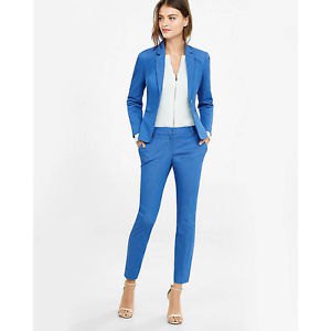 white zip up blouse with blue suit jacket and ankle pants