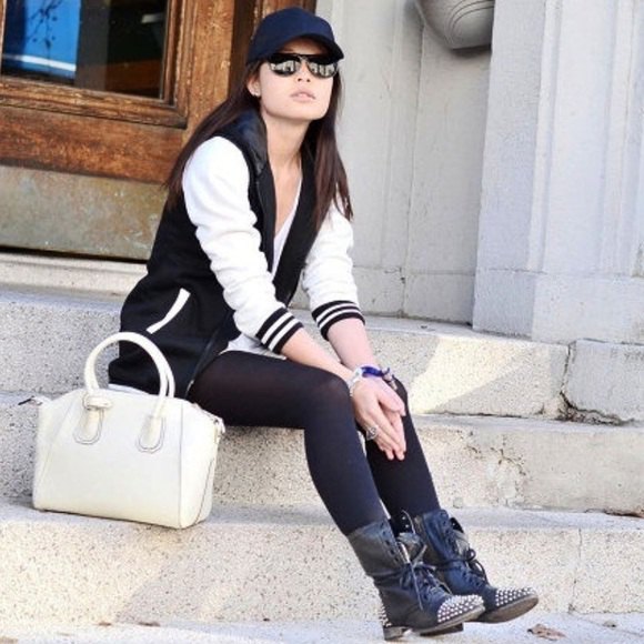 black and white baseball jacket with tunic t-shirt and studded combat boots