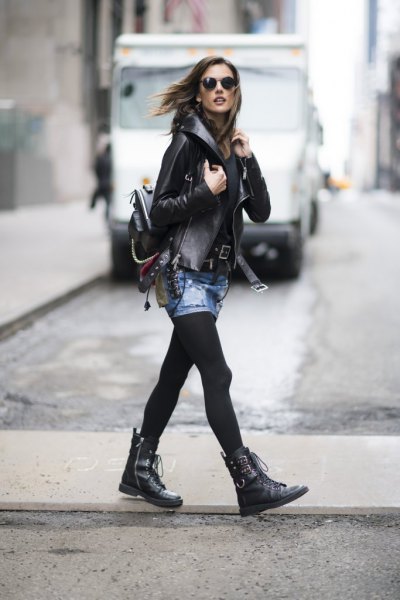Leather jacket with mini skirt and black leather boots