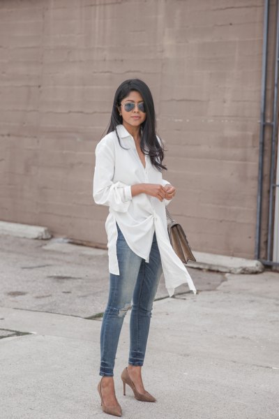 white tunic shirt with gray skinny jeans and heels