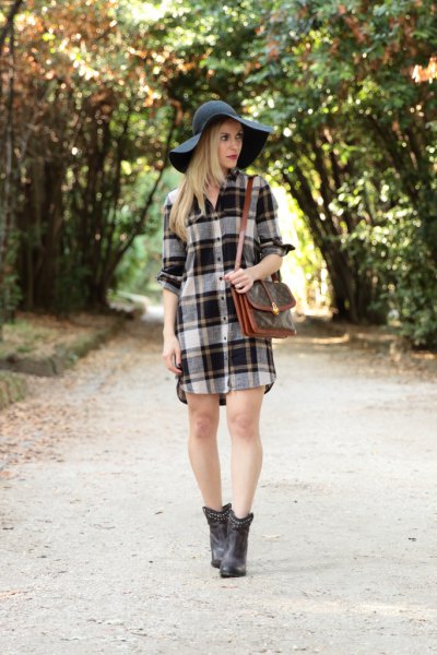 gray and white plaid flannel shirt dress with black floppy hat