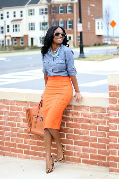 blue chambray shirt with orange midi skirt