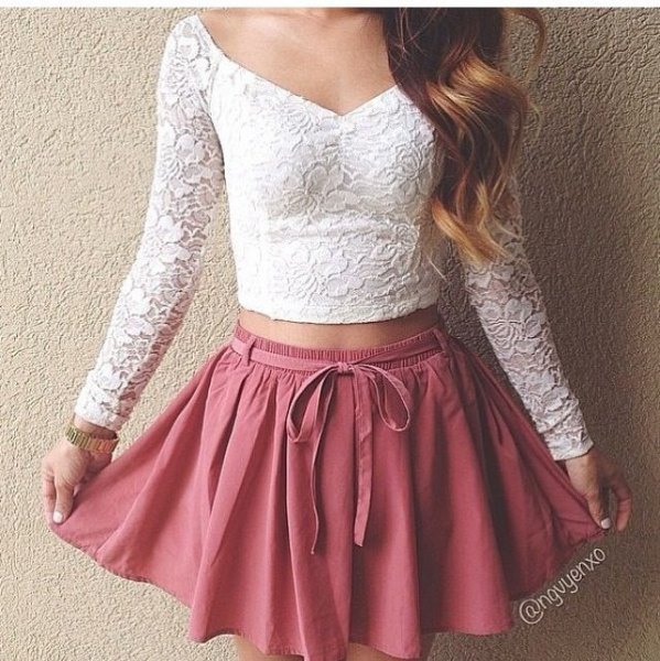 long sleeve white lace V-neck top and pink skater skirt