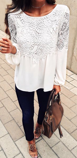 white long-sleeved lace blouse with black skinny jeans