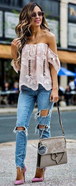white strapless top with floral embroidery and boyfriend jeans
