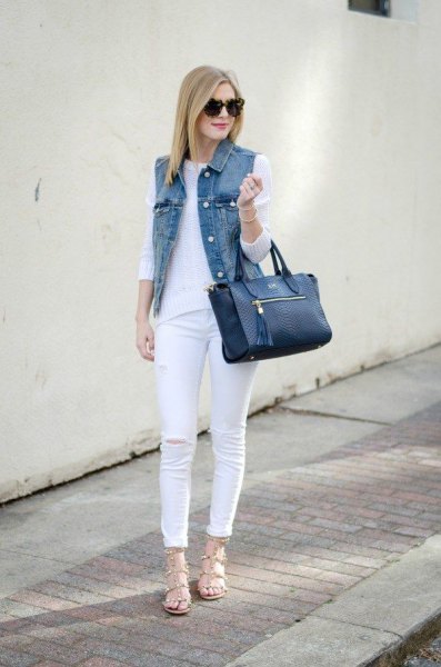 Skinny jeans outfit with a white knit sweater