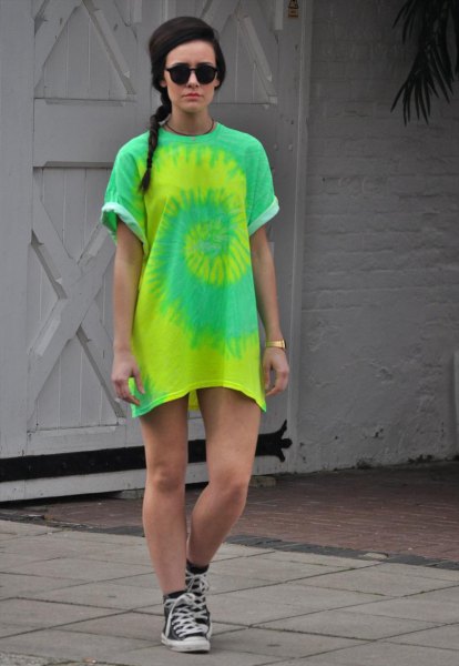 yellow and green tie-dye t-shirt dress with sneakers