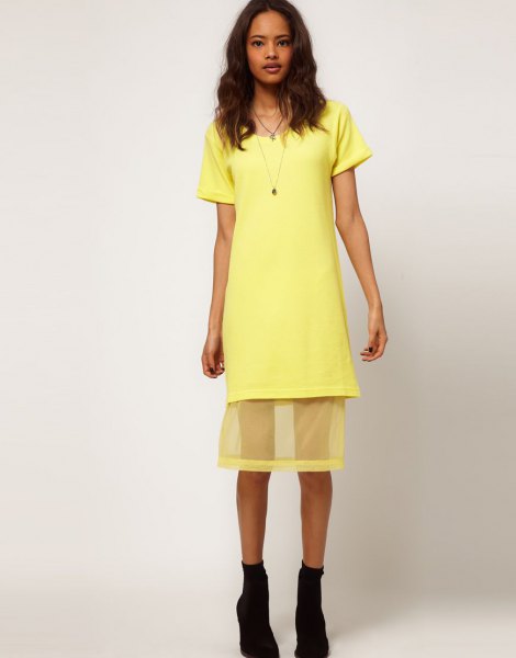 yellow shirt dress with semi-transparent mesh overlay