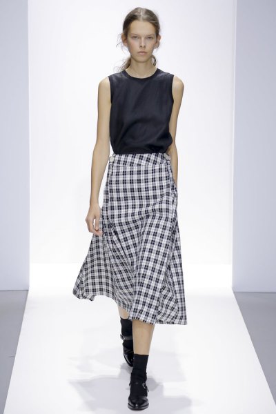 black sleeveless silk top with plaid midi skirt