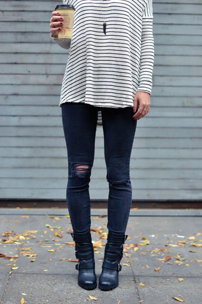 black and white striped long sleeve t-shirt with dark blue moto jeans