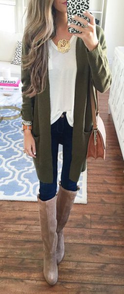 green cardigan with white top and gray knee high boots