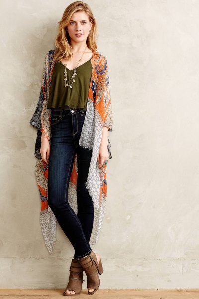 green crop top with spaghetti straps, silk cape and dark jeans
