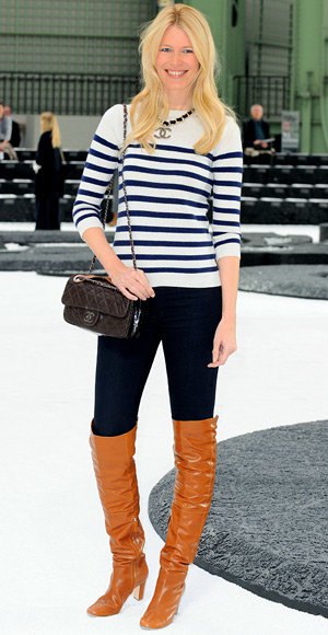 black and white striped knit sweater with tall jeans and orange boots