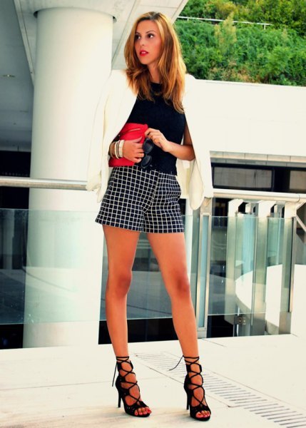white blazer with black blouse and plaid shorts