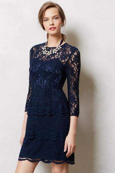 dark blue sheath dress with three-quarter sleeves made of lace