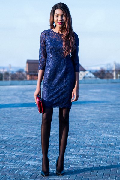 Half-sleeved mini dress with black stockings and dark blue heels