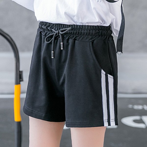 white long-sleeved t-shirt with black running shorts