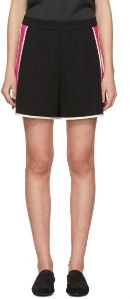 black sleeveless top with flowy mini shorts